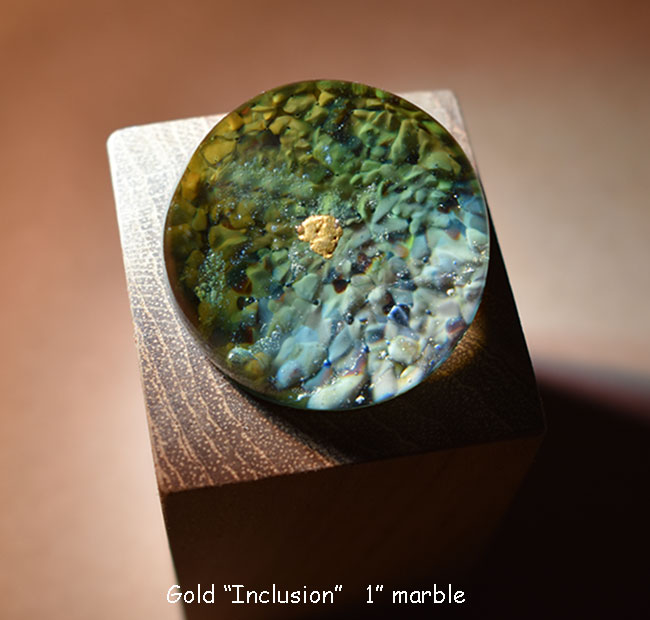 Gold “inclusion”, glass marble                  $175