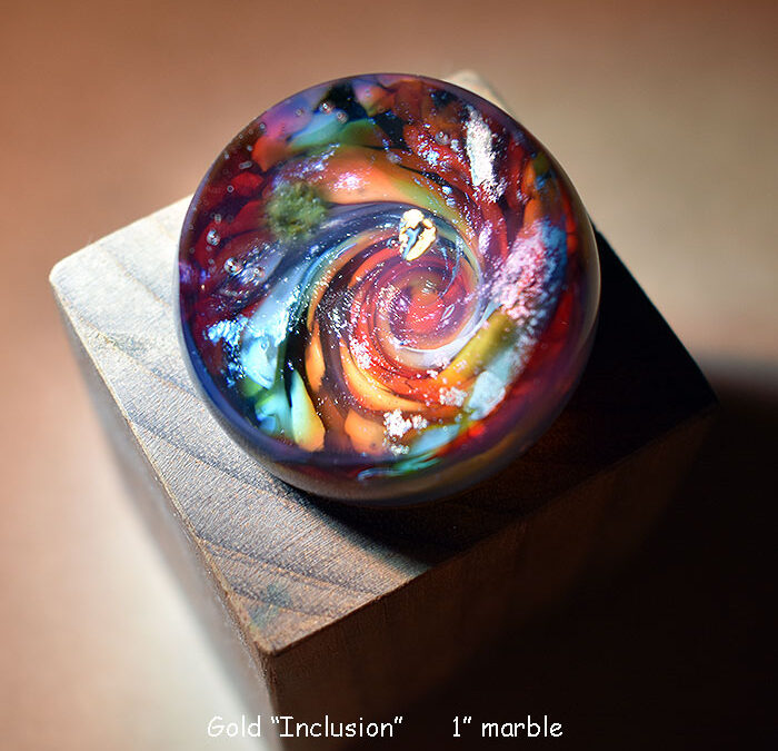 Gold “inclusion”, glass marble                  $175